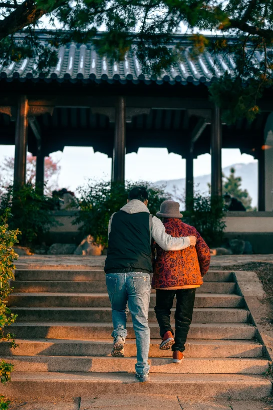 Companion and resident walking outside